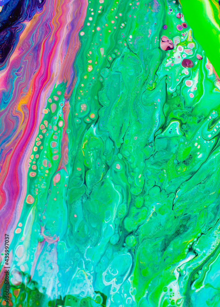 Abstract painting made of liquid acrylic with fluid art technique with colorful bright colors.