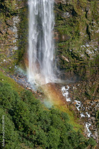 Beautiful rainbow colors at roadside waterfall in Thrumshingla national park  Mongar district  eastern Bhutan