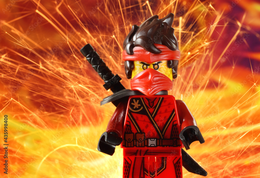 Editorial illustrative image of lego minifugure Kai red ninja with sword  weapon on fire background Stock Photo | Adobe Stock