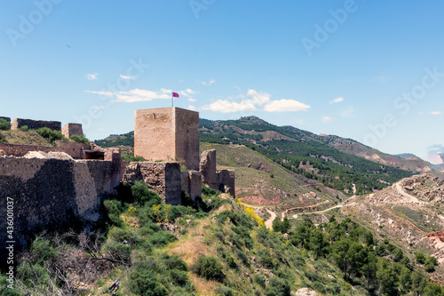exterior view of part of the wall and tower of the medieval castle of Lorca Murcia Spain  located on top of a hill with privileged views for its defense