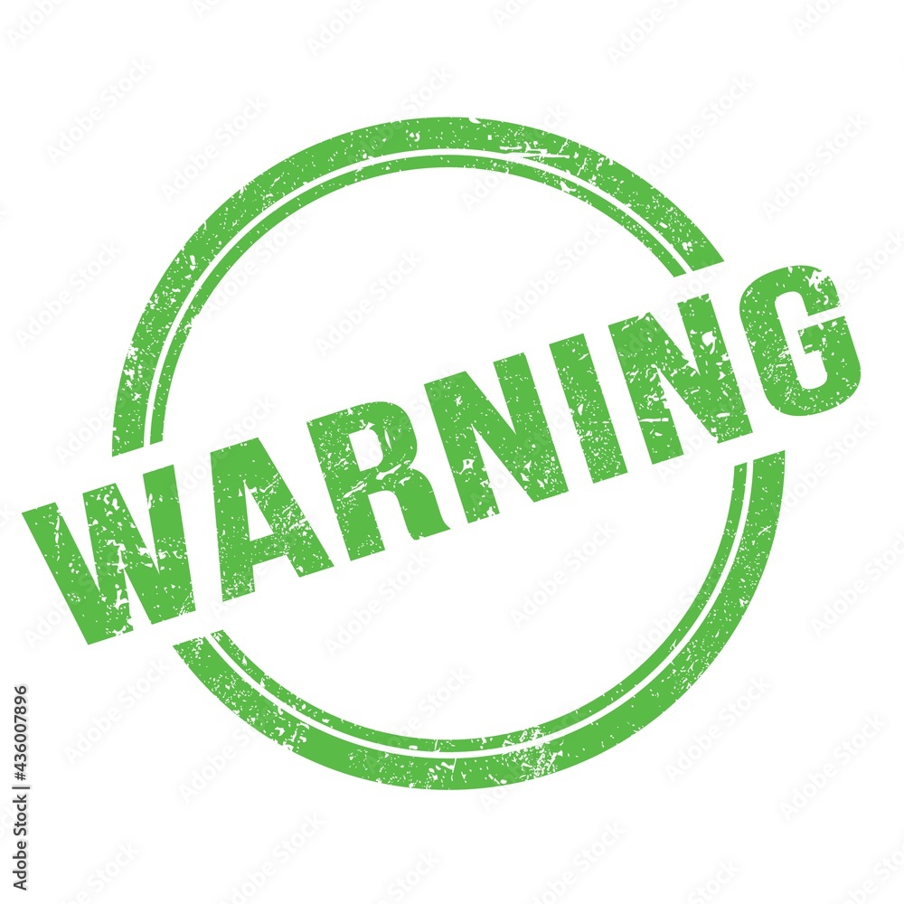 WARNING text written on green grungy round stamp.