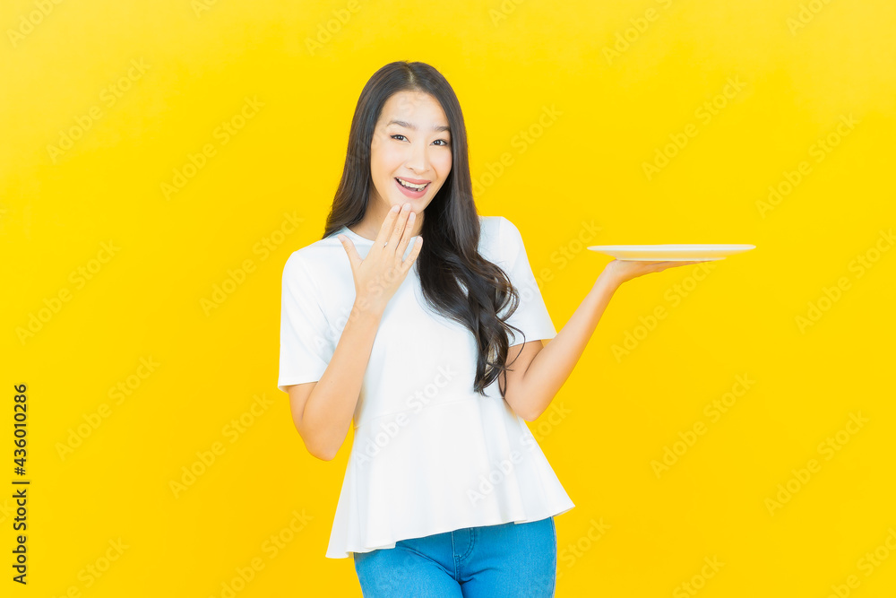 Portrait beautiful young asian woman smile with empty plate dish Portrait beautiful young asian woman smile with empty plate dish