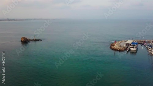 Wallpaper Mural Aerial Panning Shot Of Nautical Vessels Moored In Sea At City, Drone Flying Towards Structures Against Sky - Acre, Israel Torontodigital.ca