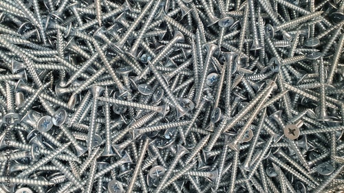 self-tapping screw for installation of metal roofing and other construction works, self-tapping screw, as a background