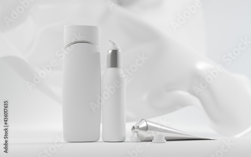 Milk cosmetics on background falling silk cloth. Skin care cosmetic product, shampoo, body lotion in white bottle with silver dispenser, metal open tube with hand cream or toothpaste, mock up banner