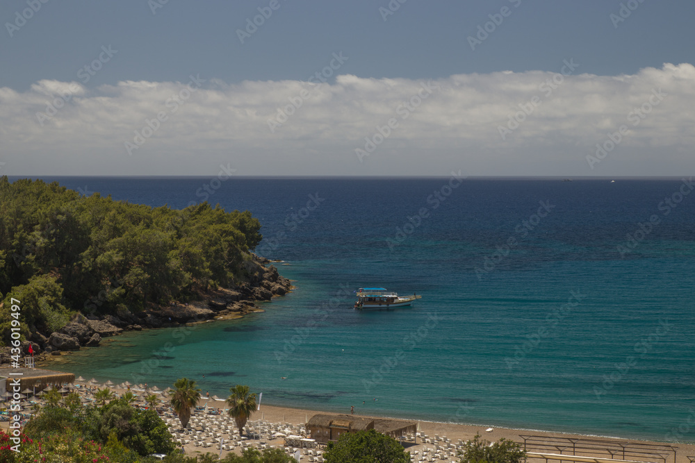 Fototapeta premium ship in the sea near the shore