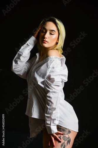 Natural as she is. erotic games and desire. sensual girl in morning. perfect body shapes. seducing you. sexy girl undressing. woman wear male white shirt. fashion and beauty. female lingerie style