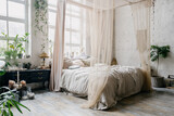 Boho chic bedroom with king size bed