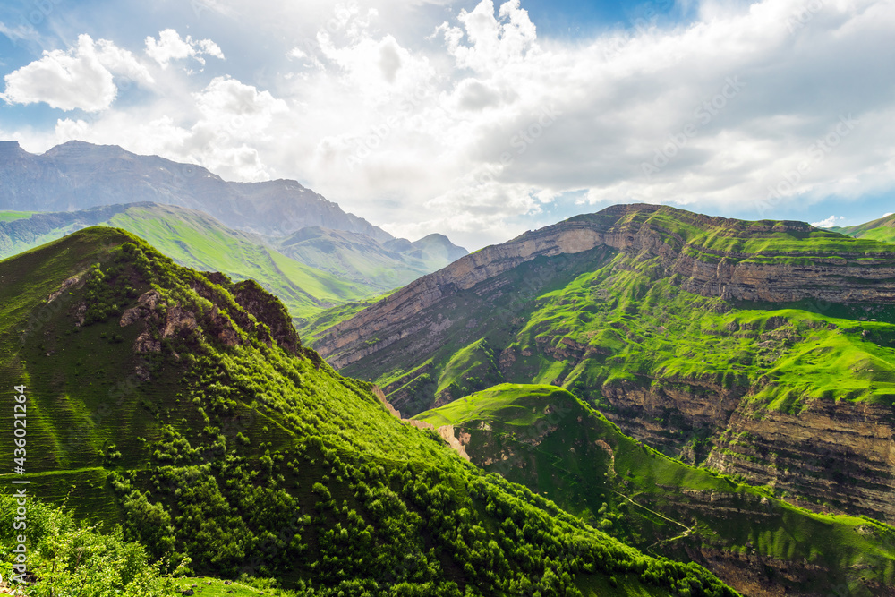 Green mountains and blue clouds landscape Green mountains and blue clouds landscape