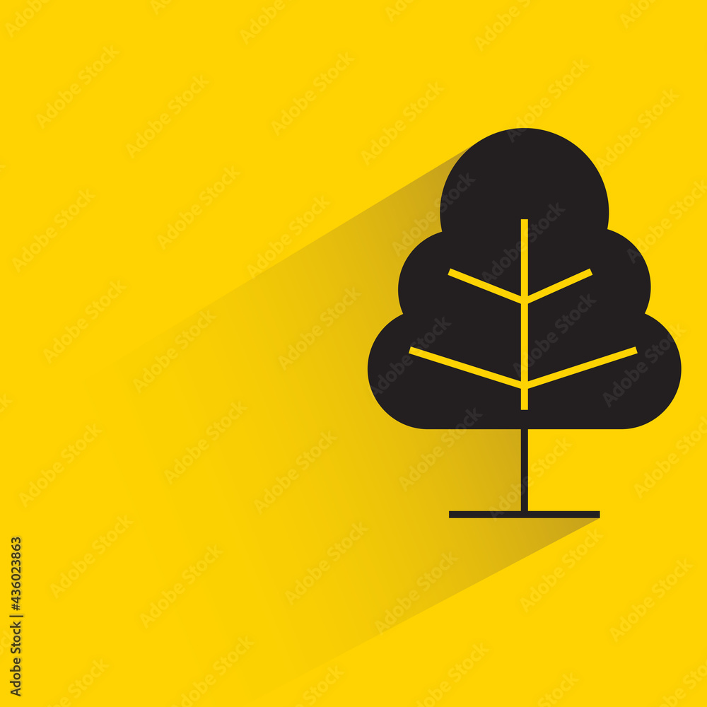 tree with shadow on yellow background