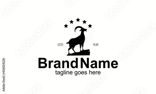 Logo of Native Goat Standing on Top of a Rock Mountain