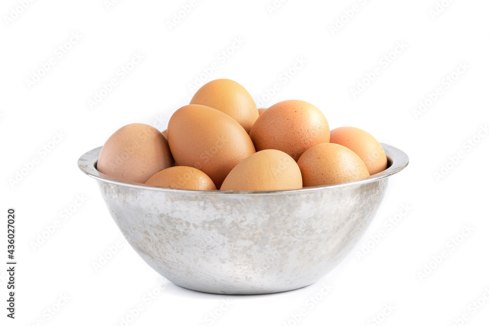 Fresh eggs in a stainless bowl, Isolated on white background Fresh eggs in a stainless bowl, Isolated on white background
