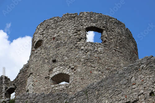 Low angle closeup details of historic Ehrenberg Castle in Reutte,Tyrol, Austria under a cloudy sky photo