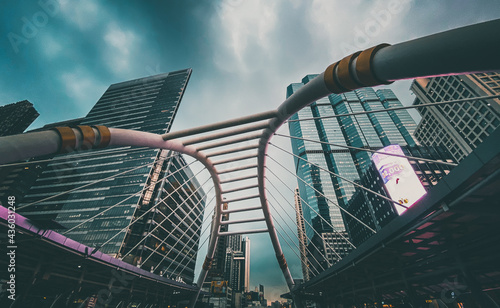 Chong Nonsi skywalk arch bridge at sky train station BTS in Sathorn business district in Bangkok Thailand photo