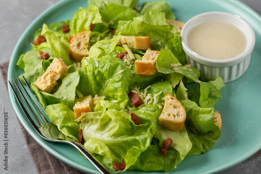 Caesar salad with croutons and bacon. Caesar salad with croutons and bacon.