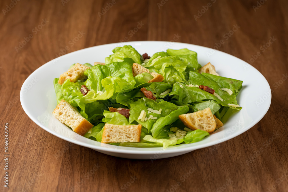 Caesar salad with croutons and bacon. Caesar salad with croutons and bacon.