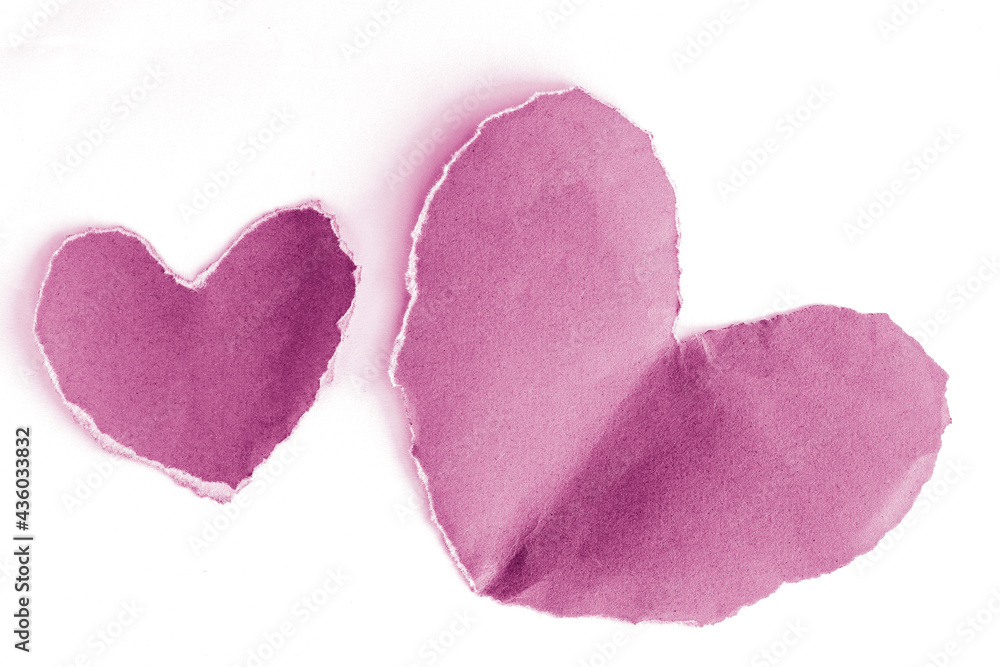 Ripped pink paper heart shaped isolated on white