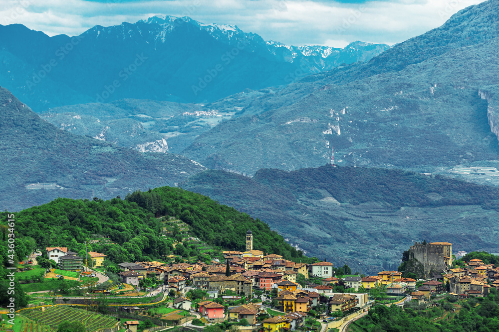 Obraz premium Cute small italian village in italy with mountains in background