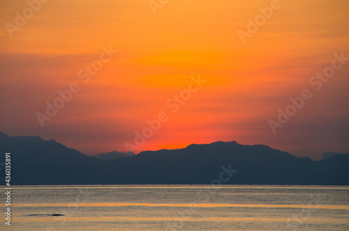 Silhouette island and sea sunrise time. Thailand. © konjaunt