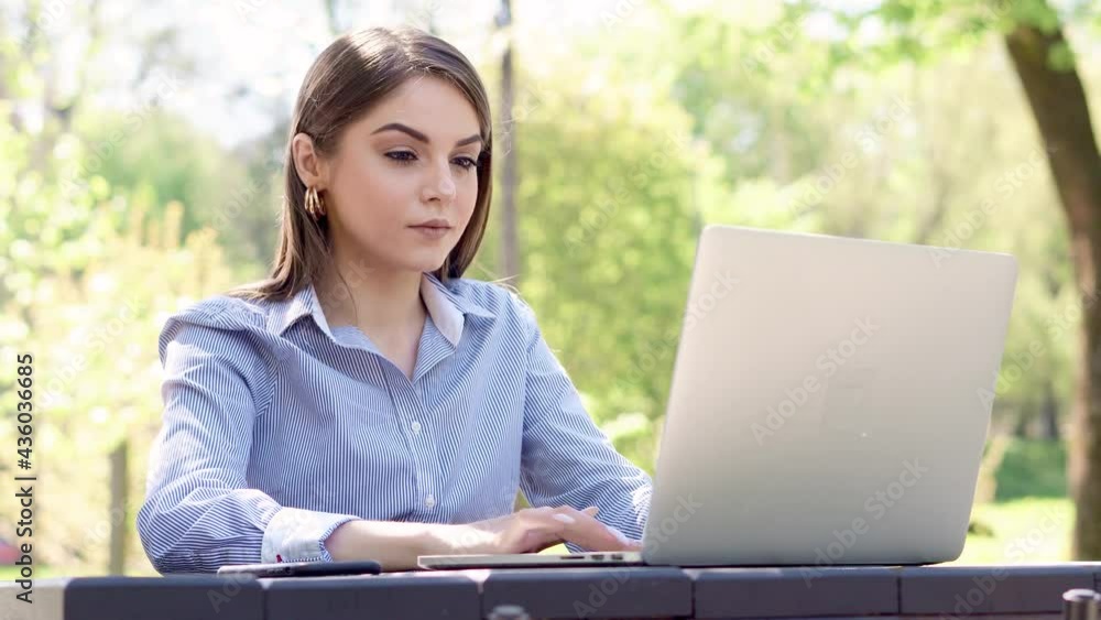 European businesswoman use laptop outdoors European businesswoman use laptop outdoors