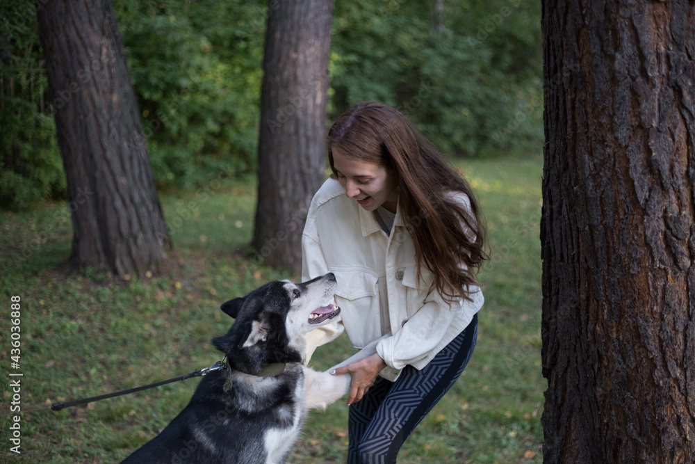 the girl is very happy with the dog the girl is very happy with the dog