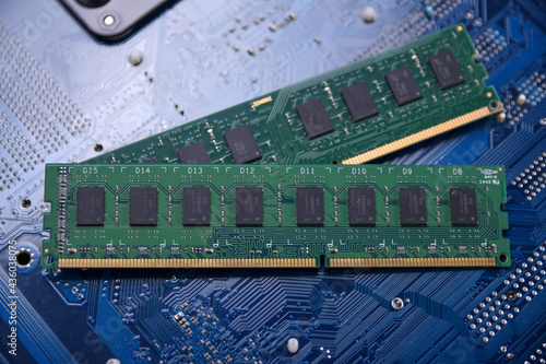 Computer memory RAM on motherboard background . Close up. system, main memory, random access memory, onboard, computer detail. Computer components . DDR3. DDR4. DDR5