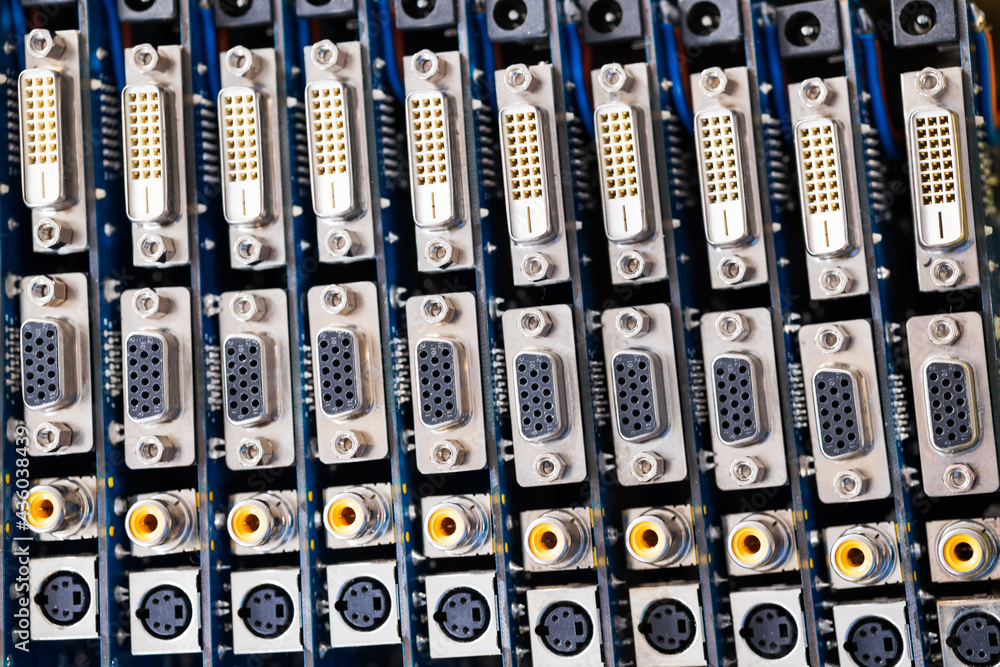 Close-up blurry metal sockets on a computer video board