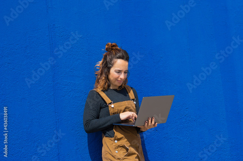 women laptop street blue