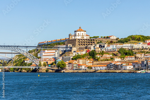 A historic and modern architecture of Vila Nova de Gaia over Douro River, Portugal photo