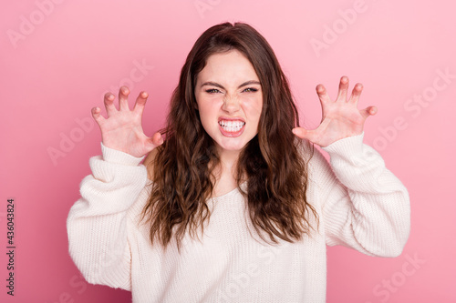 Photo of young attractive girl fooling show fingers claws growl lion isolated over pastel color background