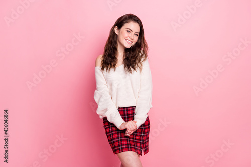 Photo of gorgeous friendly girl toothy smile look camera wear sweater isolated on pink color background