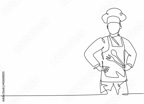 Continuous one line drawing of young male chef posing and holding spoon and fork before cooking. Professional job profession minimalist concept. Single line draw design vector graphic illustration