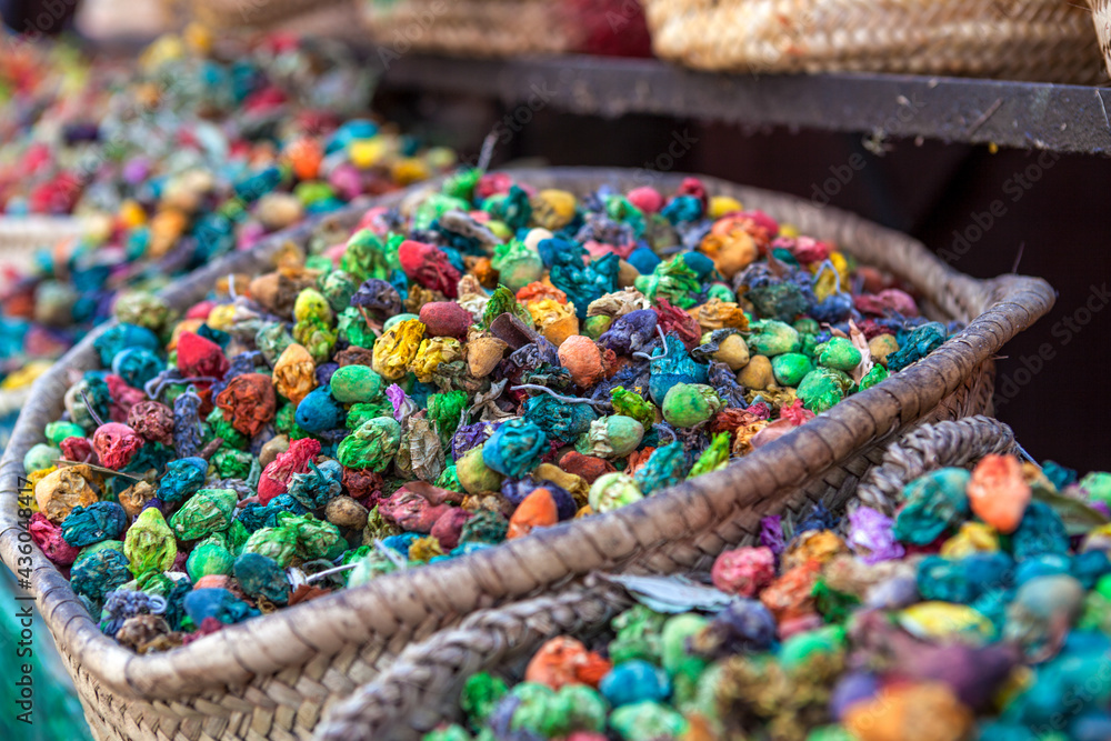 Obraz premium Colourful Moroccan spices, herbs and dried flowers on a market in Marrakesh - Central Morocco