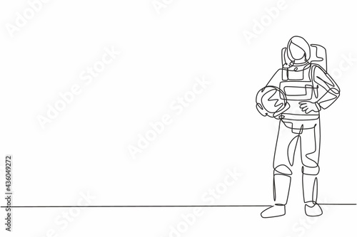 Single continuous line drawing of young female astronaut holding helmet with hands on hip. Professional work job occupation. Minimalism concept one line draw graphic design vector illustration