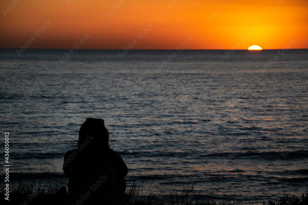 Person Silhouette Watching Sunset