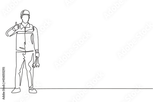 Continuous one line drawing mechanic stands up with a thumbs-up gesture and holding the wrench to perform maintenance on the vehicle engine. Single line draw design vector graphic illustration.