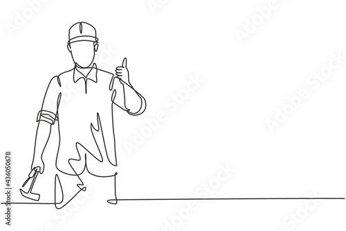 Single continuous line drawing a carpenter with a thumbs-up gesture works in his workshop making wooden products. Skills in using carpentry tools. One line draw graphic design vector illustration.