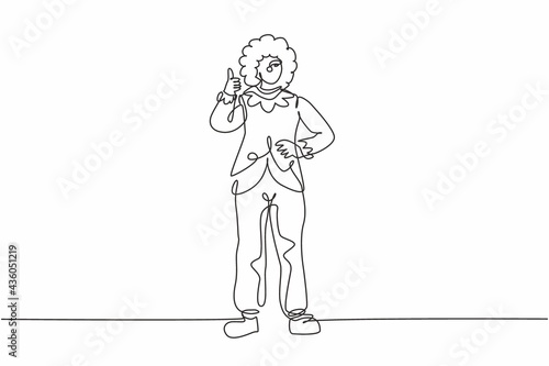 Single one line drawing of female clown stands with a thumbs-up gesture wearing wig and clown costume ready to entertain the audience in circus. Continuous line draw design graphic vector illustration
