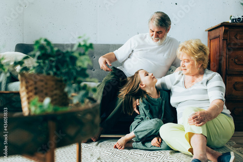 Granddaughter meets grandparents after a long separation due to isolation