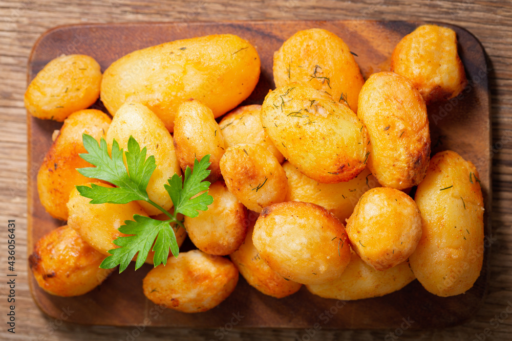 baked potatoes with parsley, top view baked potatoes with parsley, top view