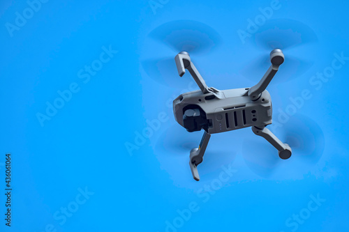 Photography Close up shot of a quadracopter drone hovering near the camera at Pune India