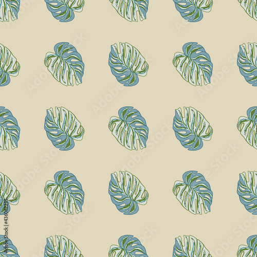 Decorative blue tropical monstera leaves seamless pattern in doodle style. Pastel light pink background.