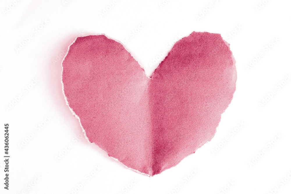 Ripped red paper heart shaped isolated on white