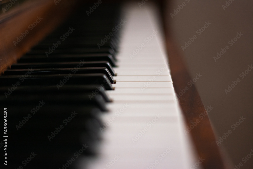 Piano, piano keys. Piano close-up. Blurred background