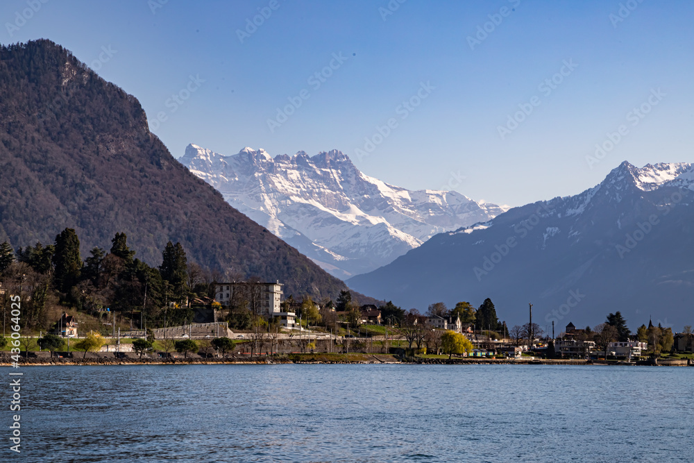 Montreux, Switzerland 04.04.2021 - View from Chillon Castle, Lake Geneva and the Alps in the background