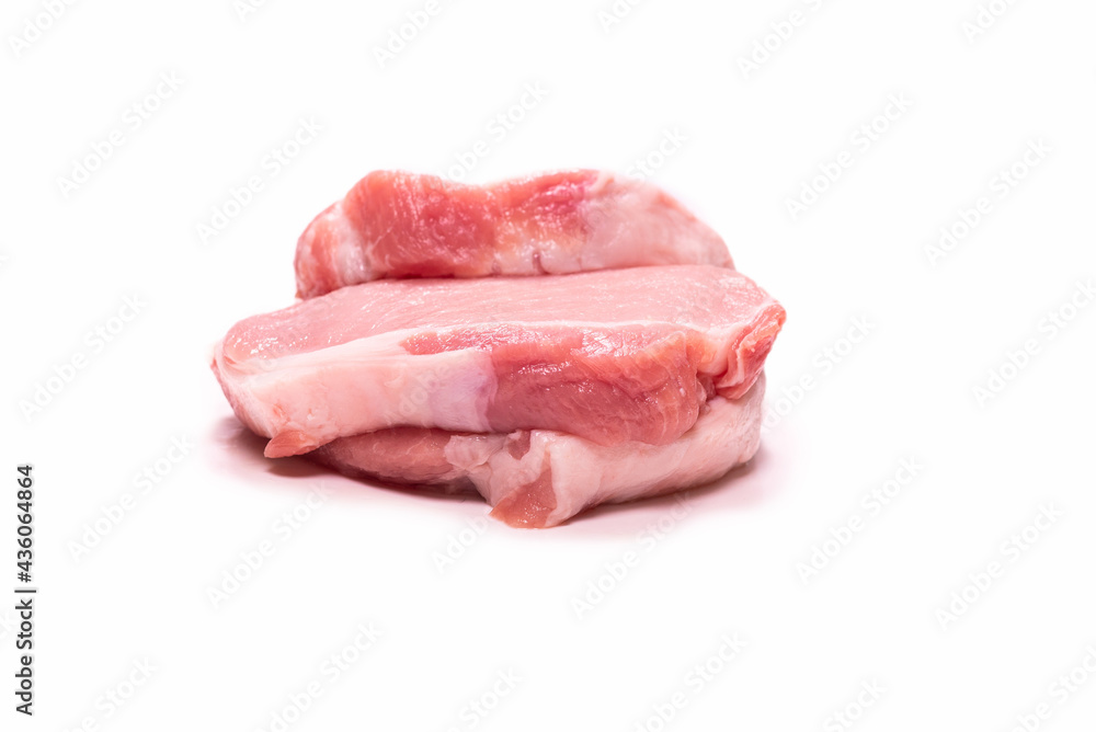 Raw pork pieces isolated on a white background. Raw pork pieces isolated on a white background.