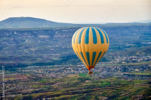 Turkey, Cappadocia, hot air balloons over the Cappadocia mountains, a popular destination for tourists.