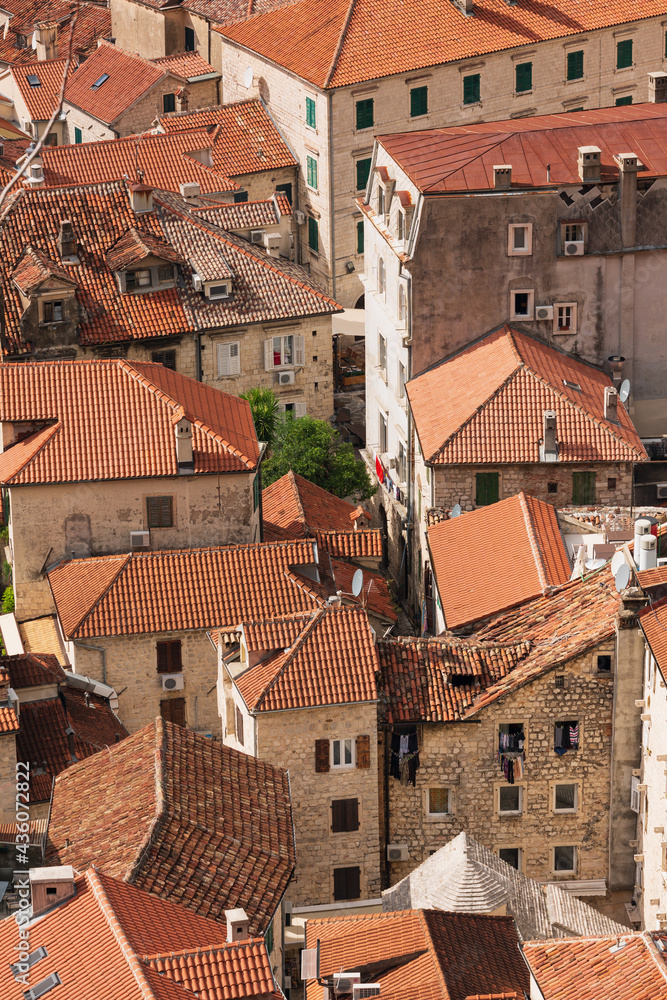 Close-up top view of the old roofs with red tile, the old town of Kotor in Montenegro