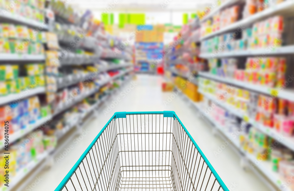 Shopping cart in supermarket. Shopping cart in supermarket.