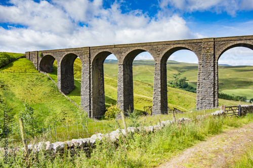 Looking down on the Artengill Viaduct from the Pennine Bridleway, with Ingleborough and Whernside in the distance. photo